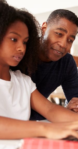 Father and Daughter working on homework